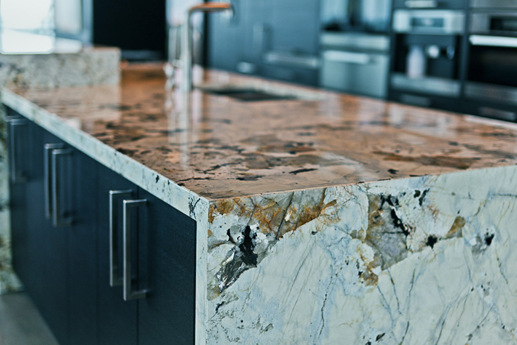 granite kitchen countertop in miami. Gray and brown kitchen island countertop.